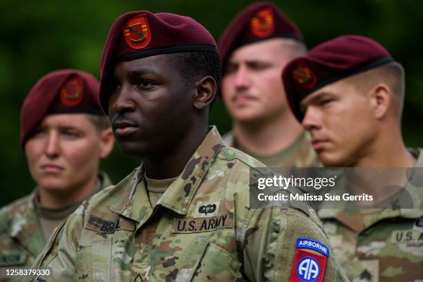 Soldiers with 2nd-319th Airborne Artillery Unit listen to remarks from the 18th Airborne Corps Commander Lt. Gen. Christoper Donahue before a...