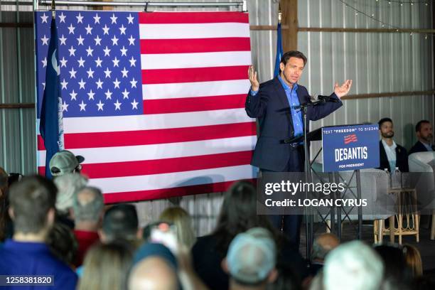 Florida Governor and 2024 presidential hopeful Ron DeSantis speaks to supporters at a campaign stop in Gilbert, South Carolina, on June 2, 2023. The...