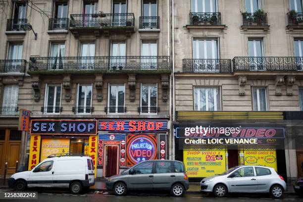 Picture taken on January 12, 2011 shows sex shops at the Paris district of Pigalle. AFP PHOTO LOIC VENANCE