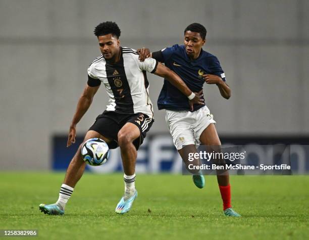 Almugera Kabar of Germany in action against Yanis Ali Issoufou of France during the UEFA European Under-17 Championship 2023 Final match between...