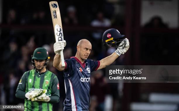 Chris Lynn of Northamptonshire Steelbacks acknowledges the applause on reaching his century during the Vitality Blast T20 match between...