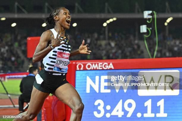 Kenya's Faith Kipyegon reacts as she wins the Women's 1500m event, setting a new world record of 3:49.11, during the Wanda Diamond League 2023 Golden...