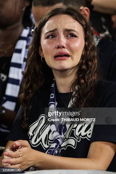Supporter of Bordeaux reacts after the French L2 football match between FC Girondins de Bordeaux and Rodez was abandoned by the referee, at Nouveau...