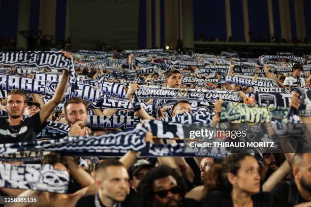 Supporters of Bordeaux react after the French L2 football match between FC Girondins de Bordeaux and Rodez was abandoned by the referee, at Nouveau...