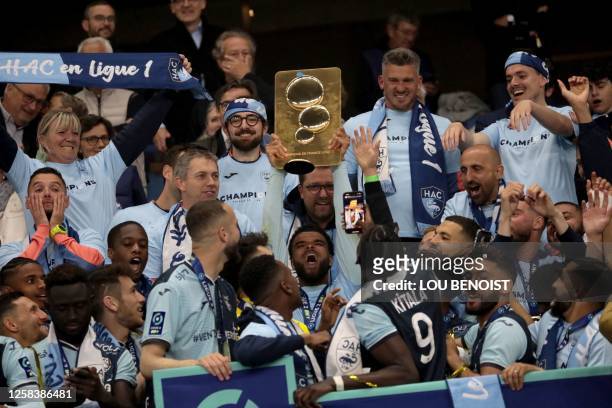 Le Havre's players celebrate their French L2 championship after the football match between Le Havre AC and Dijon FCO at Oceane Stadium in Le Havre on...