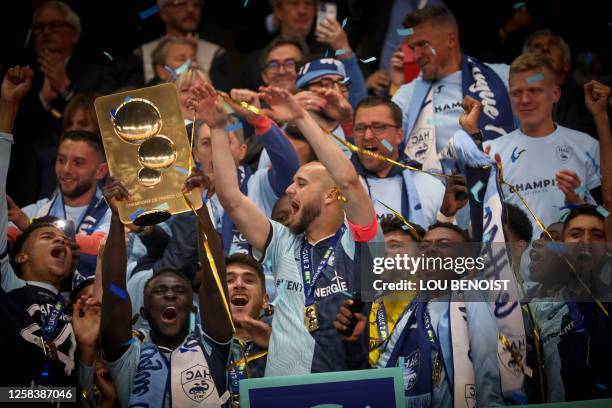 Le Havre's players celebrate with the trophy for French L2 championship after the football match between Le Havre AC and Dijon FCO at Oceane Stadium...