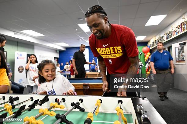 Kentavious Caldwell-Pope of the Denver Nuggets interacts with the kids at the 2023 NBA Cares Finals Legacy Project as part of the 2023 NBA Finals on...