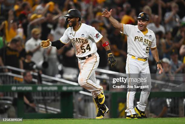 Josh Palacios of the Pittsburgh Pirates celebrates after hitting his first career home run during the seventh inning against the St. Louis Cardinals...