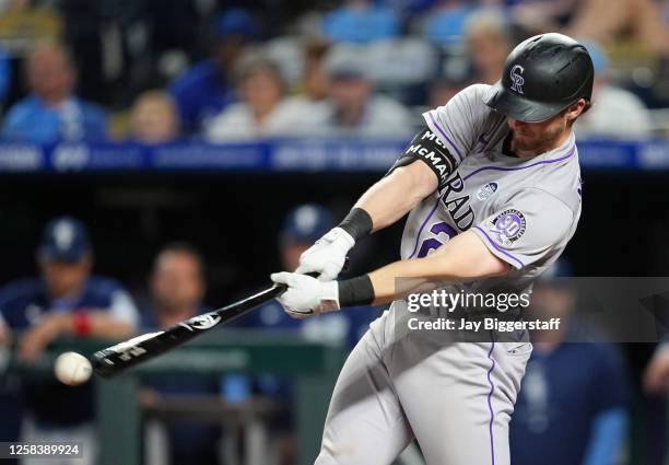 Ryan McMahon of the Colorado Rockies hits an RBI single during the eighth inning against the Kansas City Royals on June 2, 2023 in Kansas City,...