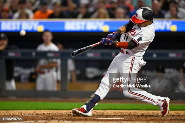 Jorge Polanco of the Minnesota Twins hits an RBI double off of Nick Sandlin of the Cleveland Guardians during the seventh inning at Target Field on...