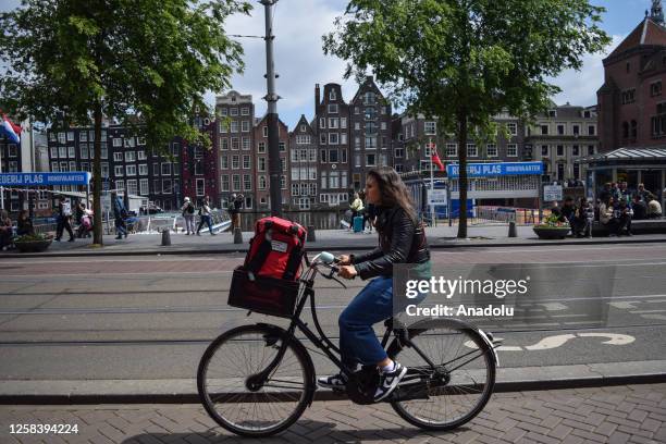 Person rides a bike during her daily life, ahead of June 03 World Bicycle Day in Amsterdam Netherlands on June 02, 2023. World Bicycle Day, declared...