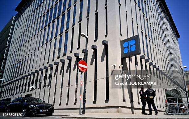 Police officers stand guard at the headquarters of the Organization of Petroleum Exporting Countries in Vienna on June 3, 2023.