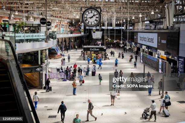 General views of the concourse at Waterloo Station during the industrial action by the RMT. Britain is heading into a second consecutive summer of...