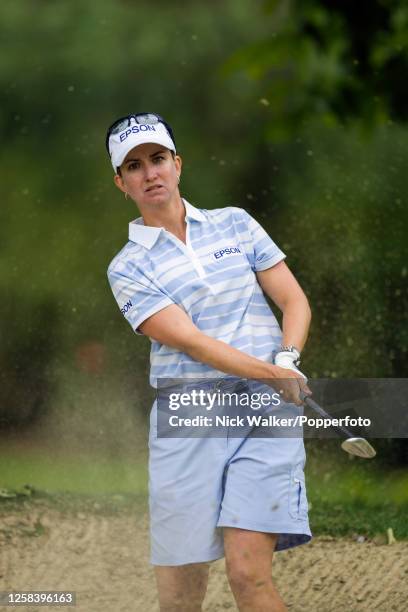 Karrie Webb of Australia plays out of a green-side bunker on the 6th hole during the final round of the Evian Masters at the Evian Resort Golf Club...