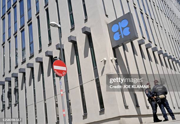 Police officers stand guard at the headquarters of the Organization of Petroleum Exporting Countries in Vienna on June 3, 2023.