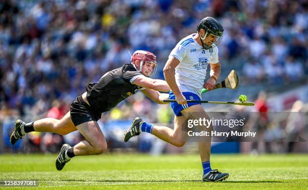 Dublin , Ireland - 3 June 2023; Niall Garland of Monaghan on his way to scoring his side's third goal despite the hurl of Lancashire's Shane Nugent...