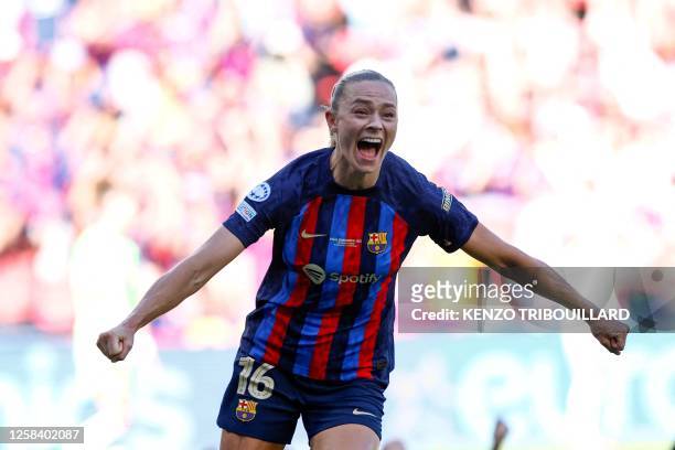 Barcelona's Swedish forward Fridolina Rolfo celebrates scoring the 3-2 goal during the UEFA Women's Champions League final football match between FC...