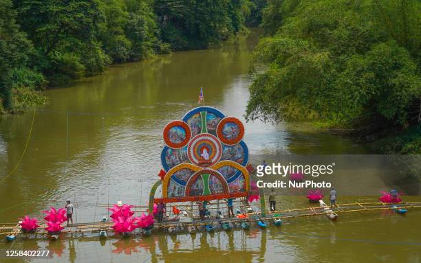 Illuminated pandal was created over a major river for the first time in Sri Lanka to celebrate the poson poya on June 3 in Ratnapura, Sri Lanka....