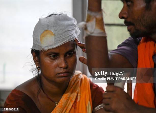 Graphic content / Wounded survivors rescued from a carriage wreckage of a three-train collision near Balasore, get treated at the Soro government...