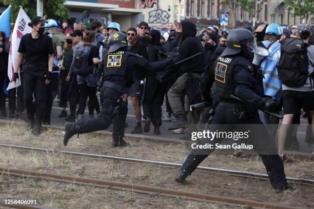 Leftist demonstrators clash with police during "Day X" protests on June 3, 2023 in Leipzig, Germany. Protesters took to the streets in Leipzig...