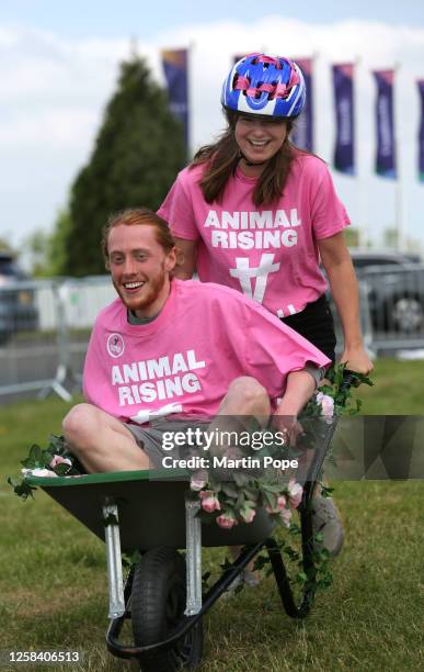 Animal Rising supporters engage in wheelbarrow racing as an example of good wholesome fun that doesn't exploit animals on June 3, 2023 in Epsom,...