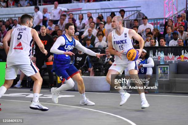 Jimmer Fredette of the USA vies with Alex Vialaret of France during the men's quarterfinal match between France and the USA on Day 5 of the FIBA 3x3...