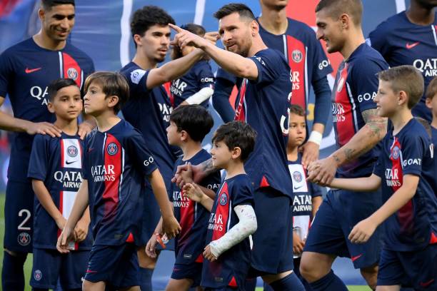 Paris Saint-Germain's Argentine forward Lionel Messi attends with his children prior to the French L1 football match between Paris Saint-Germain and...