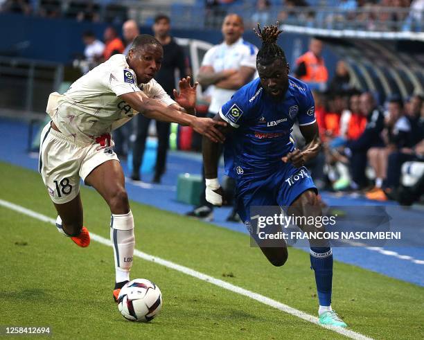 Troyes' forward Mama Balde fights for the ball with Lille's defender Bafodé Diakité during the French L1 football match between ES Troyes AC and...