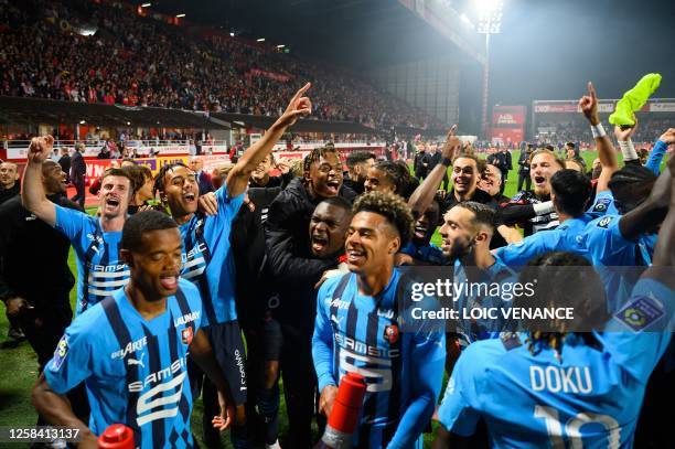 Rennes' players celebrate after winning the French L1 football match between Stade Brestois 29 and Stade Rennais FC at Stade Francis-Le Ble in Brest,...
