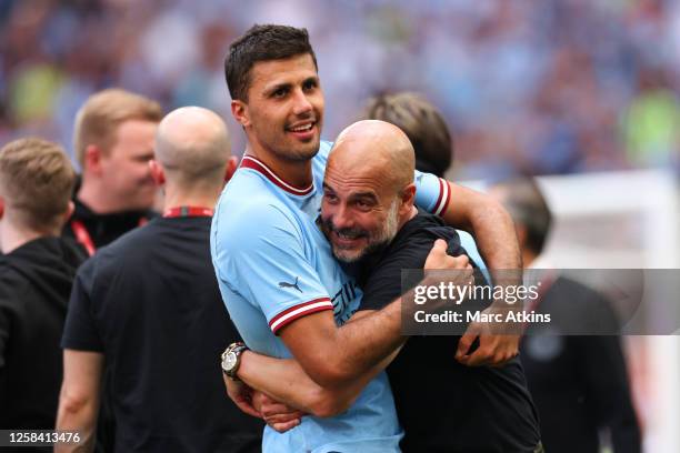 Pep Guardiola manager of Manchester City celebrates with Rodri after the Emirates FA Cup Final match between Manchester City and Manchester United at...