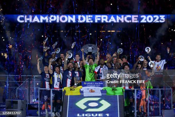 Paris Saint-Germain players celebrate their French L1 championship during the 2022-2023 Ligue1 trophy ceremony following the L1 football match...