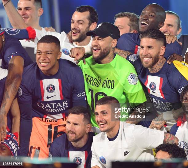 Kylian Mbappe , Lionel Messi , Sergio Ramos and Neymar of Paris Saint - Germain attend during the 2022-2023 Ligue 1 championship trophy ceremony...