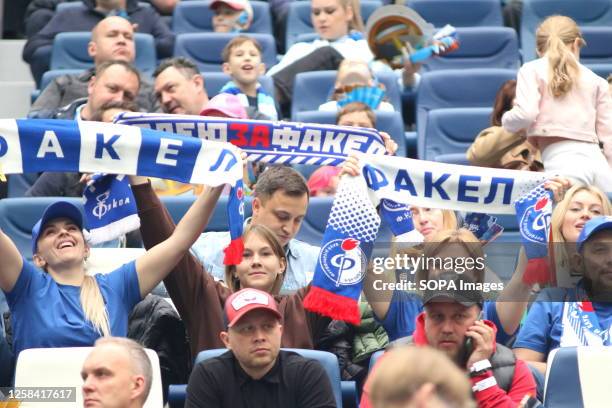 Fans of Fakel Voronezh in action during the Russian Premier League football match between Zenit Saint Petersburg and Fakel Voronezh at Gazprom Arena....