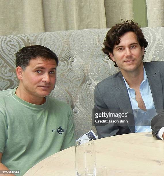 Andrew Sasson and Scott Saritano pose circa 2011 in New York City.