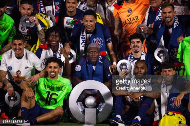 Marquinhos and players of Paris Saint-Germain lift the Ligue 1 Uber Eats trophy after the Ligue 1 match between Paris Saint-Germain and Clermont Foot...