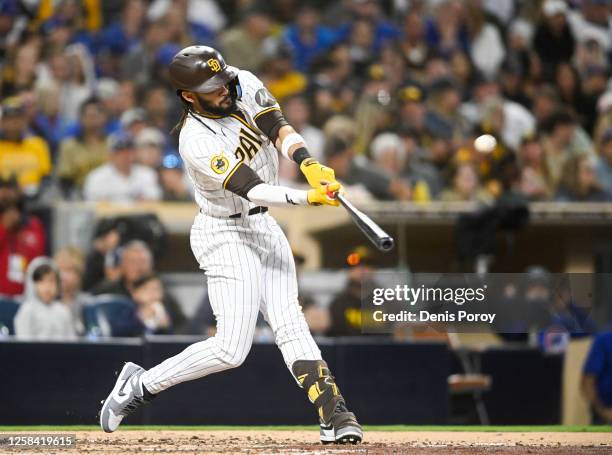 Fernando Tatis Jr. #23 of the San Diego Padres hits a solo home run during the third inning against the Chicago Cubs at Petco Park on June 3, 2023 in...