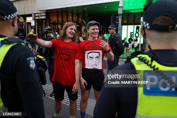 Members of the National Socialist Network perform Nazi salutes during a protest rally in Melbourne on June 4 2023.