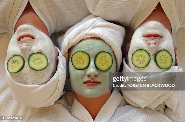 Women undergo facial beauty treatments at the spa on Daydream Island in the Whitsundays archipelago off Queensland on July 12, 2010. Australians are...