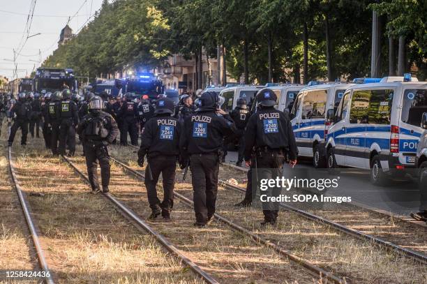 Police officers seen on a blocked road during left-wing demonstration. The so-called "national day of Action" or "Tag X" was organized by the...