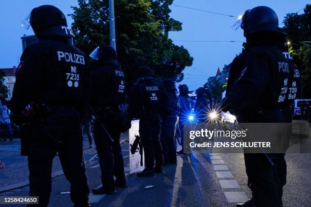Police stands during a so-called "national day of action" organised by far-left activists on June 3, 2023 in Leipzig, eastern Germany, following a...