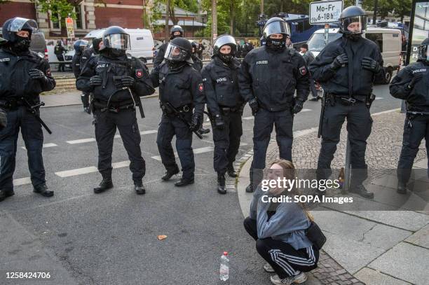 Police officers stand guard during left-wing demonstration. The so-called "national day of Action" or "Tag X" was organized by the far-left activists...