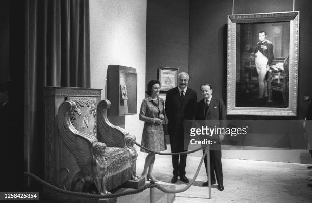 Prince Napoléon Louis Bonaparte , his wife, Countess Alix de Foresta and French Culture Minister and writer Andre Malraux pose 20 June 1969 in...