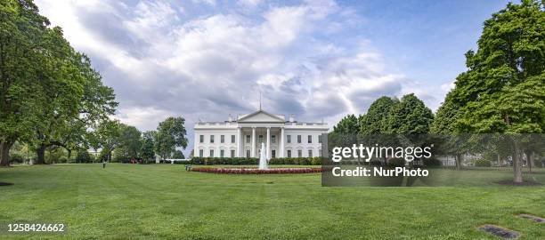 Panoramic view of the exterior of the Northern side of the White House in Washington DC as seen from Lafayette Square park and Pennsylvania Avenue....