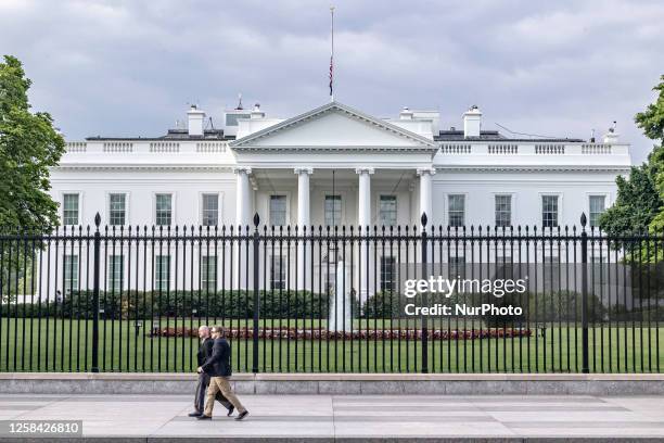 United States Secret Service police officers are patrolling out of the White House. Exterior view of the Northern side of the White House in...