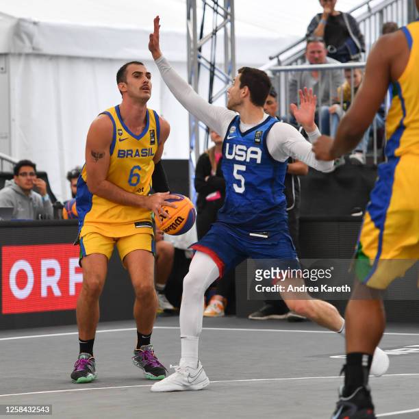 Leonardo Branquinho of Brazil vies with Jimmer Fredette of the USA during the mens semifinal match between Brazil and the USA on Day 6 of the FIBA...
