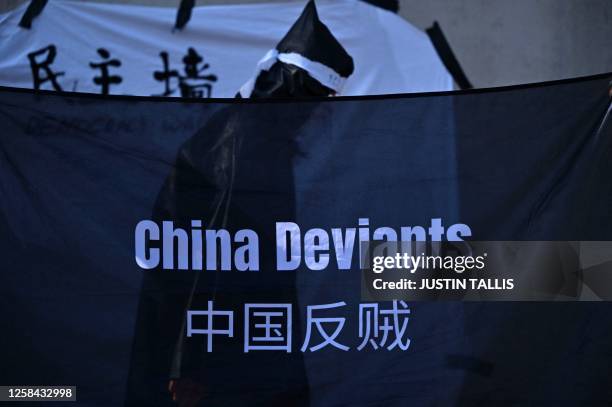 Banners are hung in Trafalgar Square in London on June 4 ahead of staging a reenactment of the Tiananmen Square incident on the 34th anniversary of...