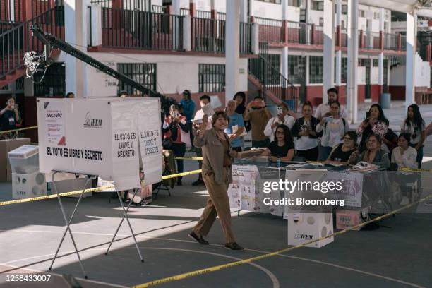 Delfina Gomez, gubernatorial candidate for the State of Mexico, casts a ballot at a polling station during gubernatorial elections in Texcoco, Mexico...