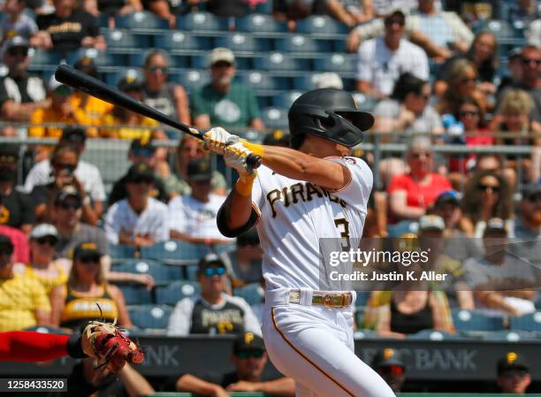 Ji Hwan Bae of the Pittsburgh Pirates hits a two-RBI single in the first inning against the St. Louis Cardinals at PNC Park on June 4, 2023 in...