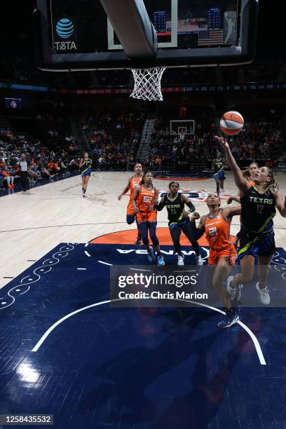 Veronica Burton of the Dallas Wings shoots the ball during the game against the Connecticut Sun on June 4, 2023 at the Mohegan Sun Arena in...