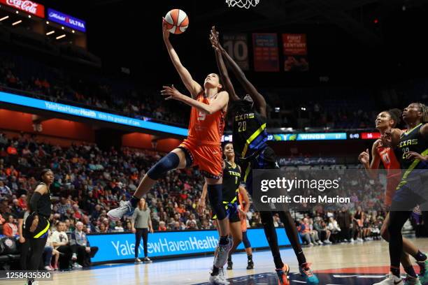 Rebecca Allen of the Connecticut Sun shoots the ball during the game against the Dallas Wings on June 4, 2023 at the Mohegan Sun Arena in Uncasville,...